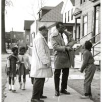 Photograph of Hartford Smith Jr. with David Lewis (1 of 3)
