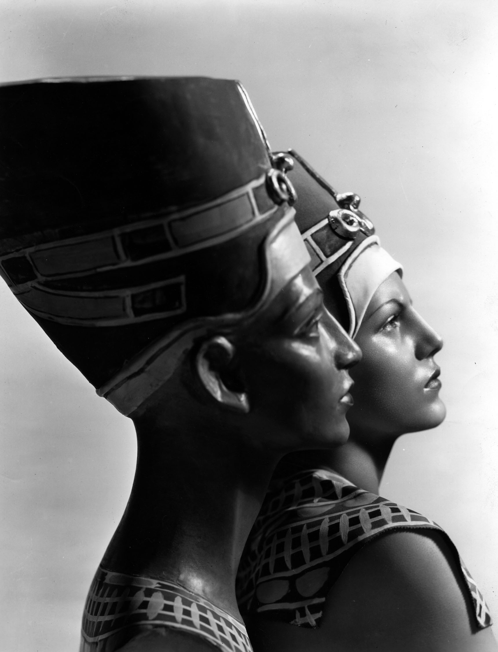 Fox publicity still featuring Cansino as Nefertiti, circa 1935. Original caption reads:"REINCARNATION? Nefertiti, Egyptian queen said to be the most beautiful woman of antiquity, seems to have been born again in the person of Rita Cansino, F ox Film debutante star, whose resemblance to the famous statue of the royal beauty is considered remarkable."