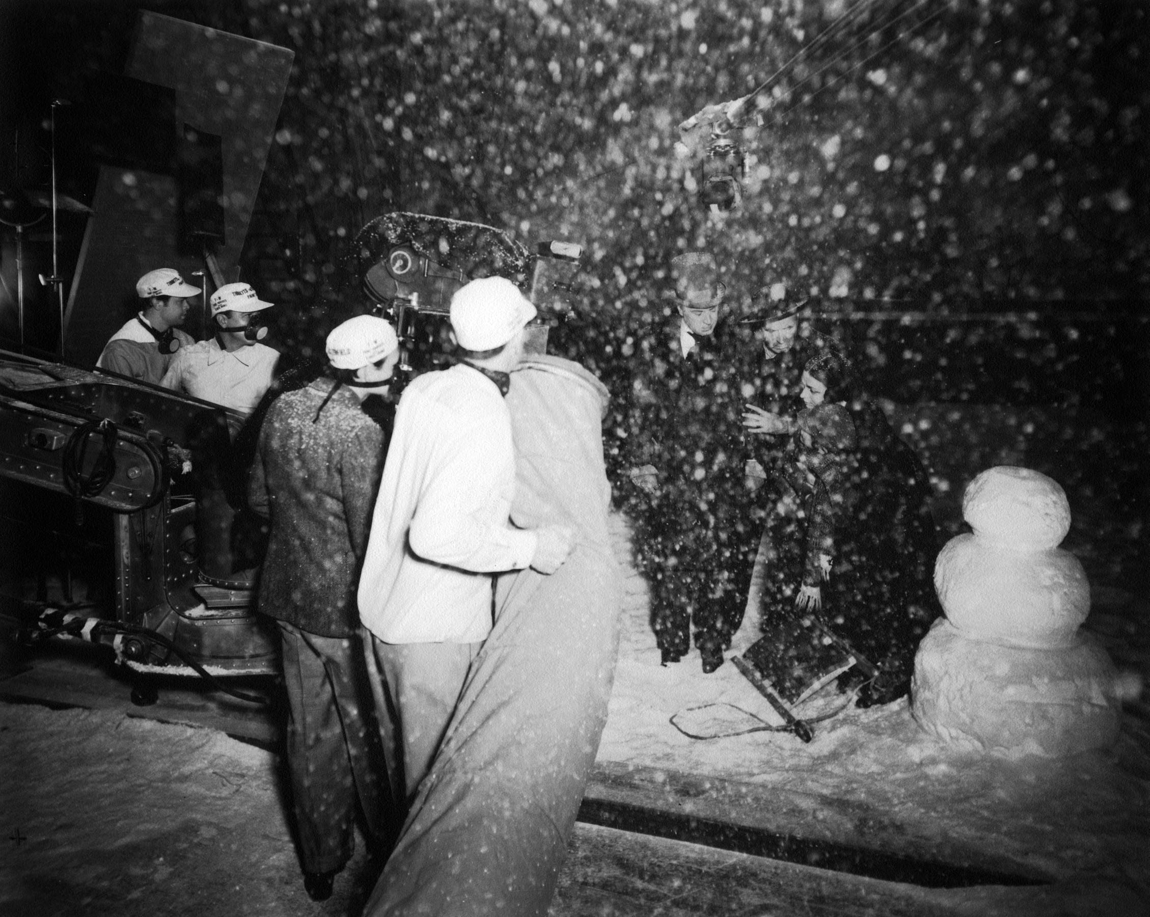 The crew wearing ventilator masks during the shooting of a snow scene.