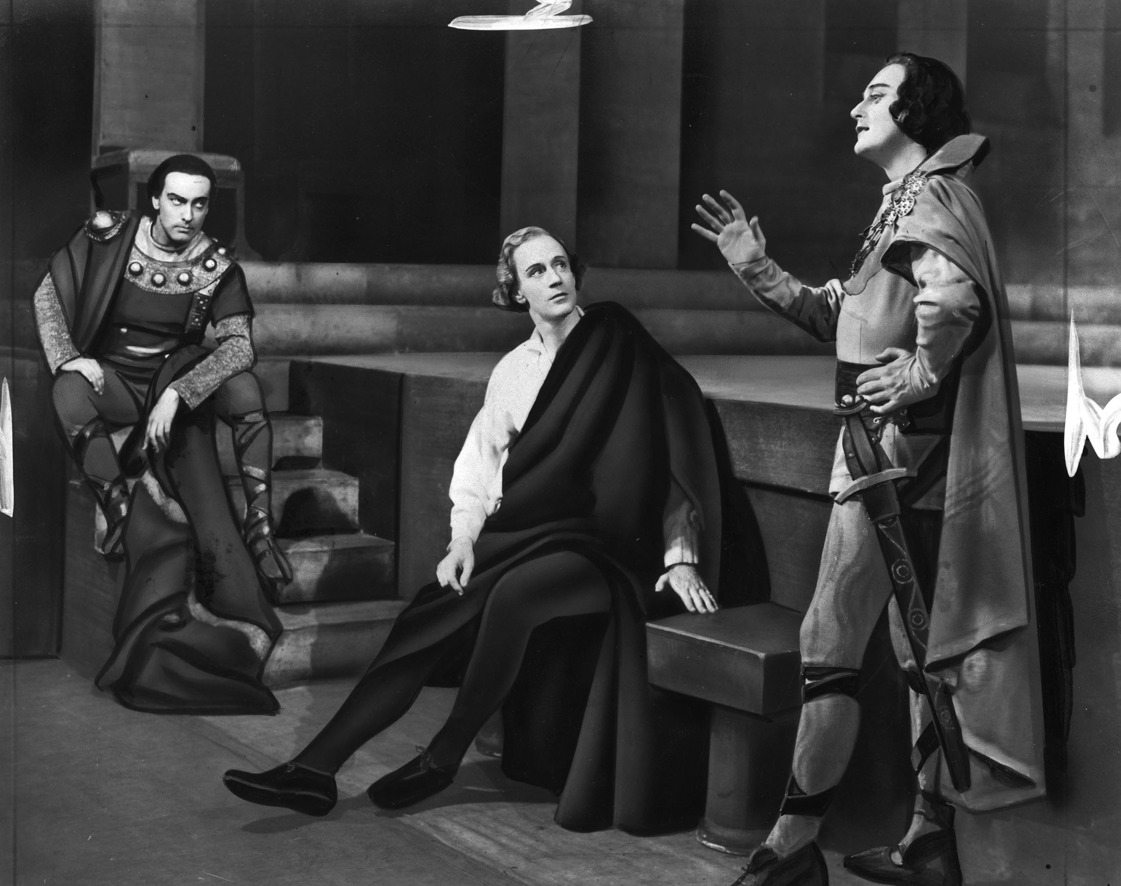Original caption reads: "Joseph Holland (Horatio), Leslie Howard (Hamlet), and Albert Carroll (Osric) in “Hamlet”, opening at the Imperial Theatre on November 10th."