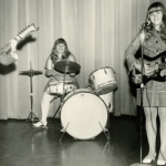 Three women playing in a band.